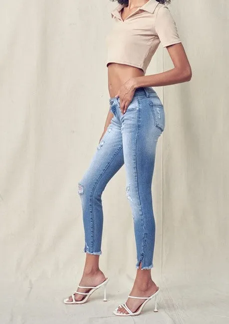 Low Rise Skinny Jeans with Distressed Ankles